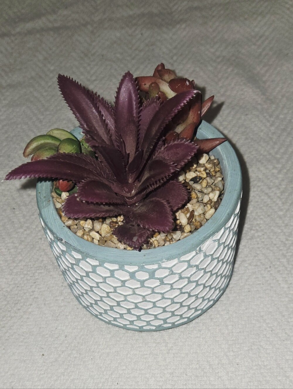 Purple Faux Succulent Arrangement in Blue Textured Planter
